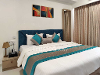 Bedroom two of Proxima Residences TrustedStay Service Apartment in Andheri East, Mumbai